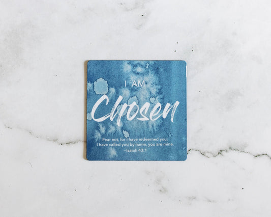 A Blue and white magnet that says I Am Chosen with a bible verse from Isaiah 43:1 on a white marble background that says Fear Not, for I have redeemed you; I have called you by name, you are mine.