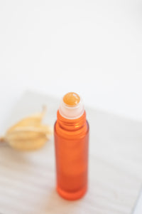 SO LOVELY Orange bottle with red aventurine rollerball