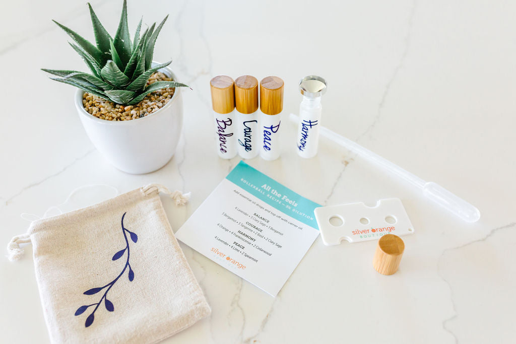 All the Feels roller bottle set with bamboo caps