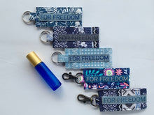 Load image into Gallery viewer, For Freedom Roller holder keychain with roller bottle *Supports Sak Saum Fair-Trade Ministry
