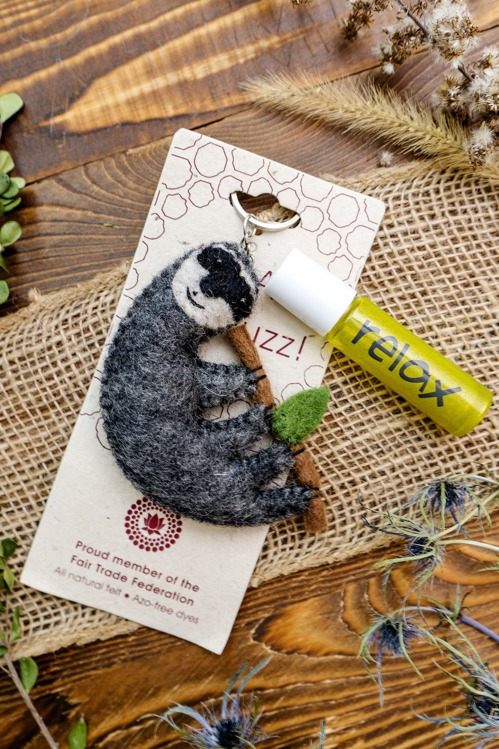 Wool diffuser keychain with roller bottle, fair trade by a women's coop in Nepal